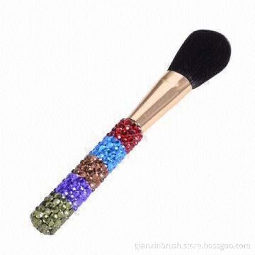 Powder brush with shiny handle